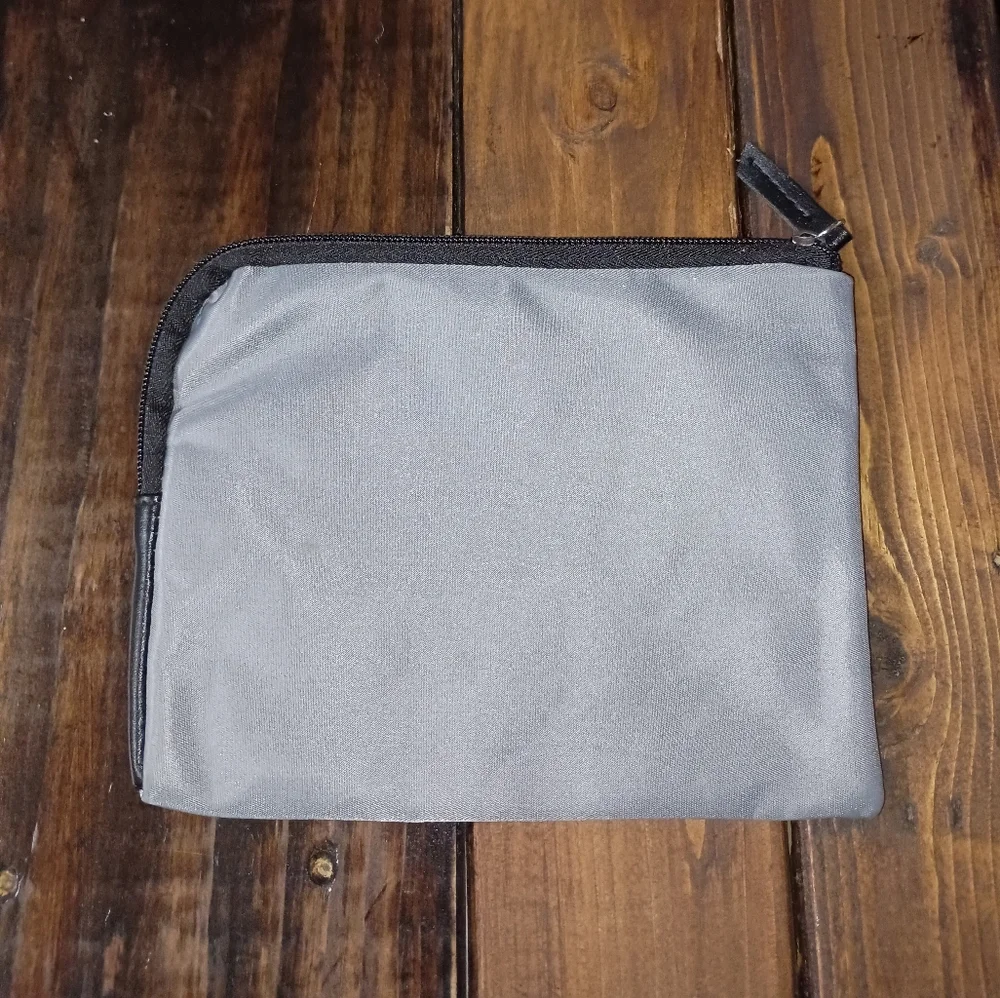 Tumi for Delta Gray Purple Lining Cosmetic Bag
